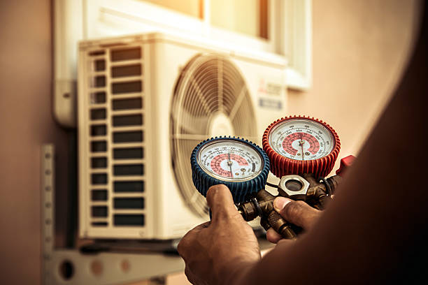 Professional Air Conditioning Service technician working in Preston, CT